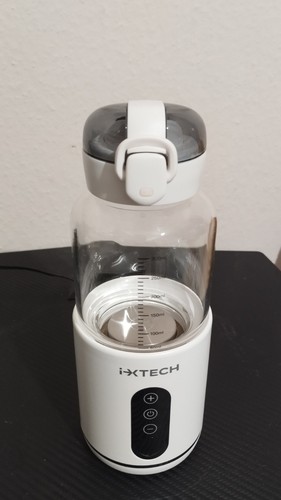 Tragbarer milchwärmer - tragbarer,
